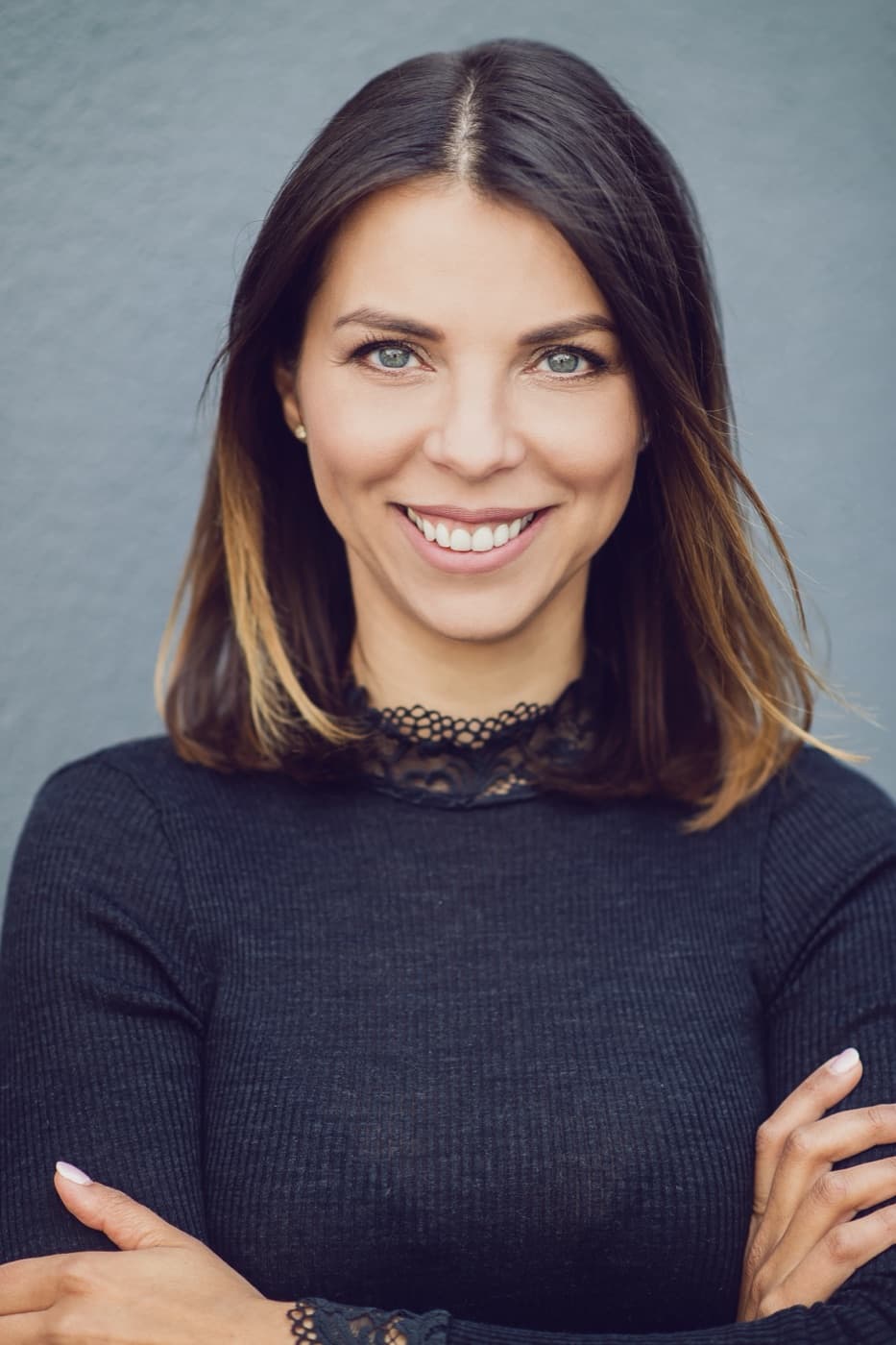Porträt von Olga Prasse, lächelnde Coachin